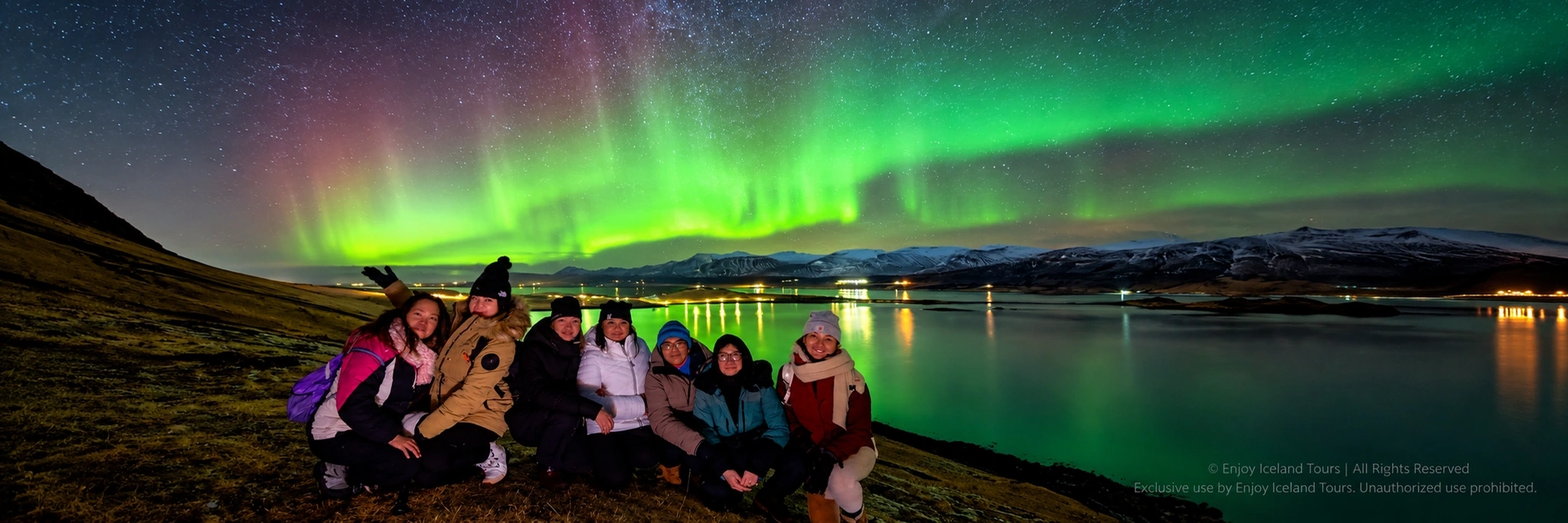 Couple enjoying a private Northern Lights tour in Iceland